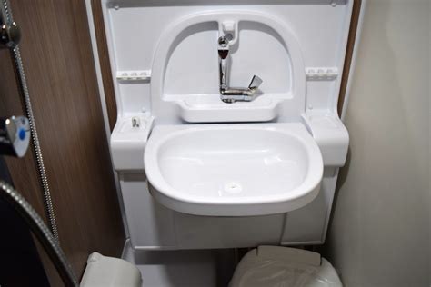 Feature In The Spotlight The Cirrus Camper Fold Out Bathroom Sink Truck Camper Adventure