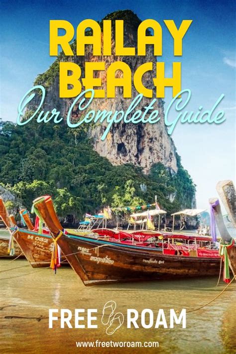 A Beach With Several Boats On It And The Words Railay Beach Our