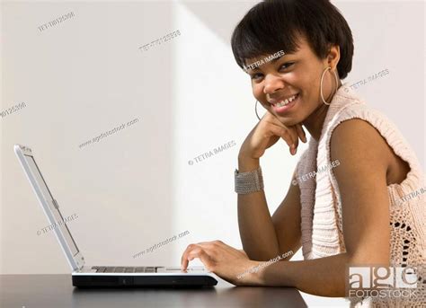 African Woman With Laptop Stock Photo Picture And Royalty Free Image Pic Tet Ti