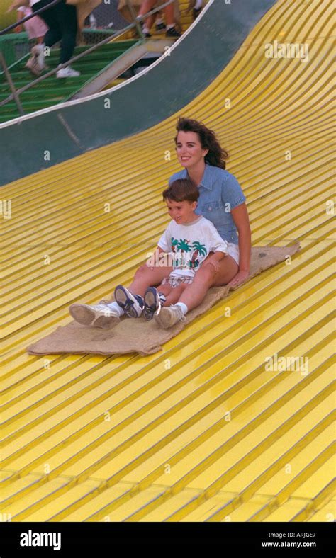 Mother And Son Riding Giant Slide At Minnesota State Fair Age 30 And 4