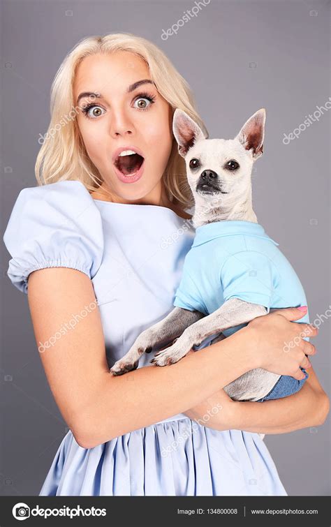 Girl Holding Cute Dog Stock Photo By ©belchonock 134800008