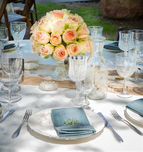 Wedding Centerpiece With Peach Roses And Pearls Floraldesignsbybethany