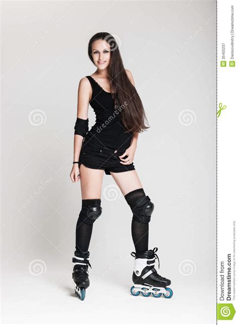 Beautiful Woman In Roller Skates Royalty Free Stock