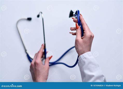 A Stethoscope In The Hands Stock Photo Image Of Physician 107696824