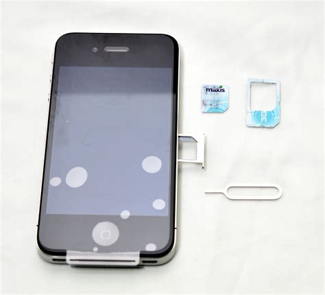 Punch out your correct sim size when you receive your sim kit in the mail. D.A.Y.D.R.E.A.M.E.R: iPhone 4