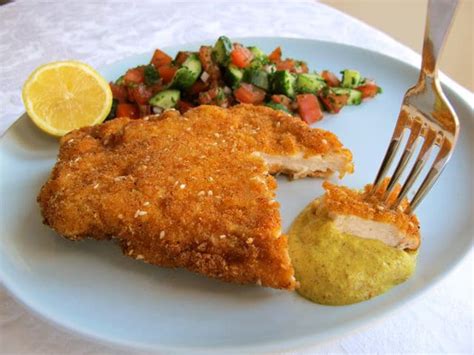 Crispy chicken schnitzel recipe baked on a sheet pan with potatoes and green beans. Chicken Schnitzel - Golden Crispy Fried Chicken Breasts