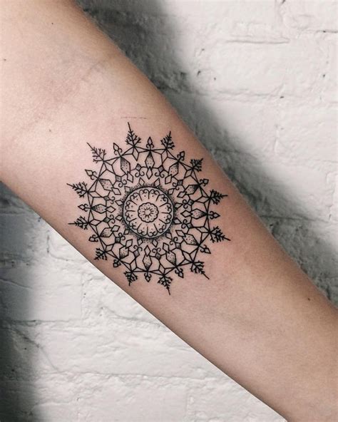 Black Dot Work Style Geometric Mandala Tattoo Inked On The Left Inner