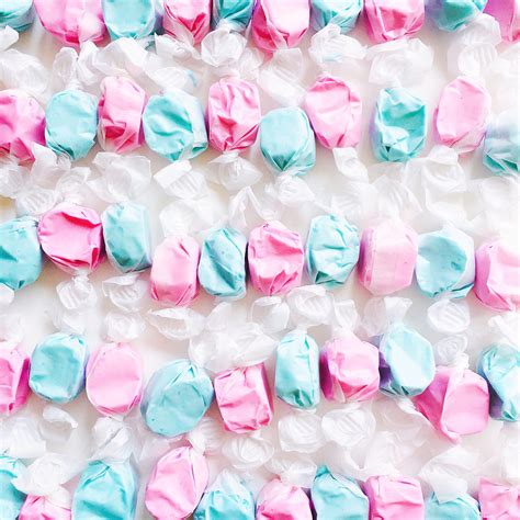 Neatly Lined Rows Of Wrapped Alternating Pattern Pink And Blue Taffy