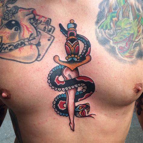 Taylor dees did this great little snake tattoo on her client heather recently. Traditional dagger legs and snake tattoo on the chest and ...