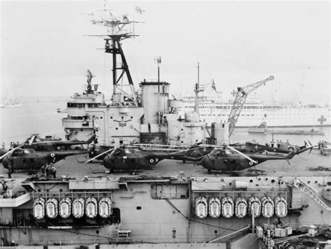 Egyptian government announces that it will eject britain from the suez canal zone and take control of sudan. File:HMS Theseus (R64) with helicopters during Suez Crisis ...