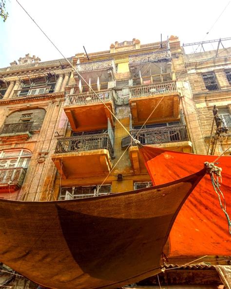 Commercial Street Of Karachi Old Area With Colored Canopies Peoviding