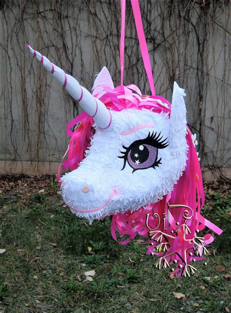 Unicorn Pinata | Unicorn pinata, Unicorn theme party, Diy halloween gifts