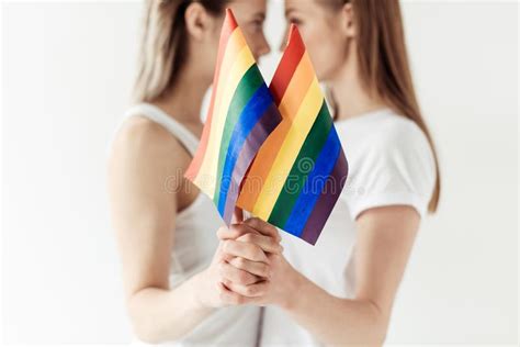 Lesbian Couple With Small Rainbow Flags Stock Image Image Of Tenderness Discrimination 109983507