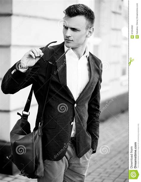 Fashion Portrait Of A Young Handsome Casual Man Looking Away Stock