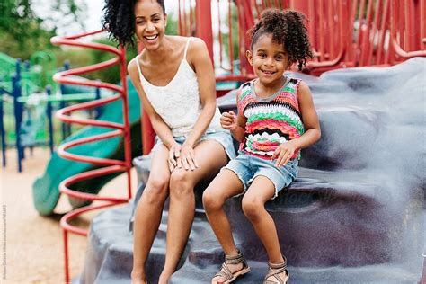 A Mother And Daughter Enjoying The Day At The Playground By Stocksy Contributor Kristen