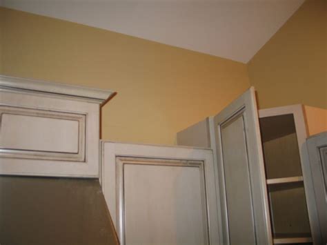 How to cut an inside crown molding corner. Crown Transitions for Corner Cabinets