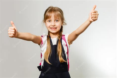 Premium Photo Little Blond School Girl With Backpack Bag Portrait