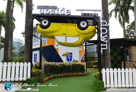 Motion sickness may apply due to the house being at a slant. KL Upside Down House, Tourist Attraction @ KL Tower ...