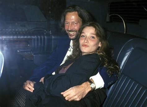 Singer Eric Clapton And Model Carla Bruni Arrive At Bill Wymans