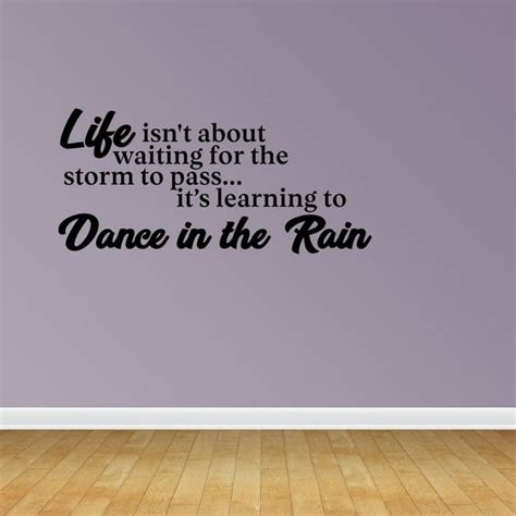 Wall Decal Quote Life Isnt About Waiting For The Storm To Pass Its