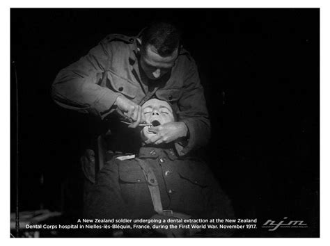 a new zealand soldier undergoing a dental extraction at the new zealand dental corps hospital in