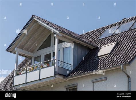 Balcony With Gable Roof On Residential Building Stock Photo Alamy