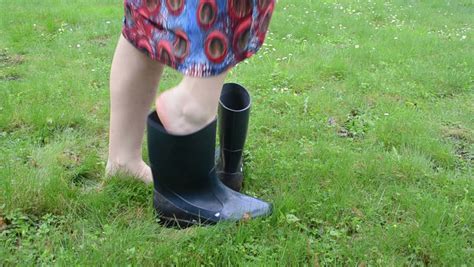 Barefoot Woman In Blue Dress On Meadow Grass Boot Welly Rubber Shoes
