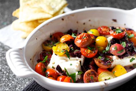 mediterranean baked feta with tomatoes - smitten kitchen | Smitten kitchen, Food, Appetizer recipes