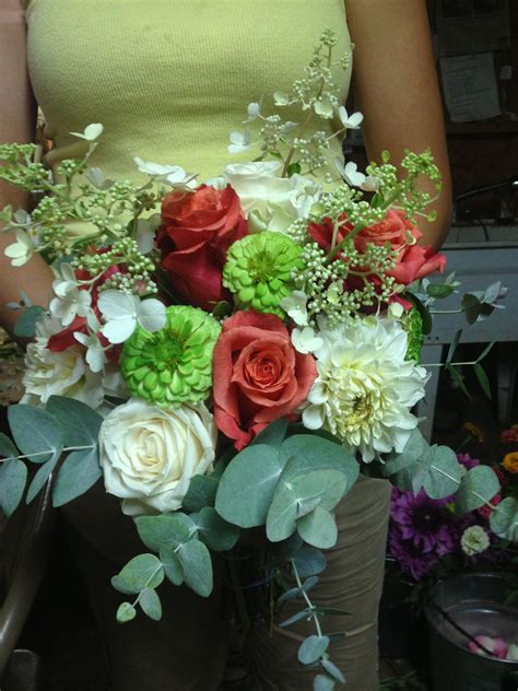 This stunning wedding is made with peach casablanca peach lilies and white carnations and white roses perfect. Coral and white wedding bouquet. | White wedding bouquets ...