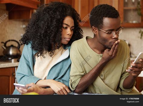 Suspicious Jealous Young African Image And Photo Bigstock