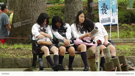 Japanese Schoolgirls Relaxing In Park In Yokohama Japan 11 Stock Video 1844906