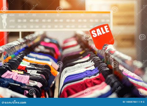 Retail Clothes Store Clearance Garment Shop With Various Bright Youth