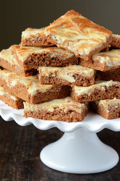 Whether you want a carrot cake that's dense, moist and full of spice and nuts, or you like a fluffier lighter carrot cake recipe that's (almost) healthful, we have loads of carrot cake recipes to help you out. Carrot Cake Cheesecake Swirl Bars (recipe via ...
