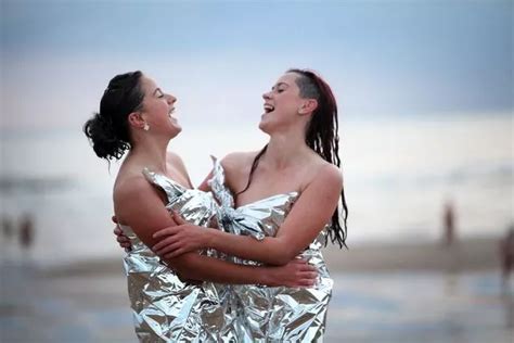 britain s biggest skinny dip hundreds brave icy north sea after baring all and taking plunge