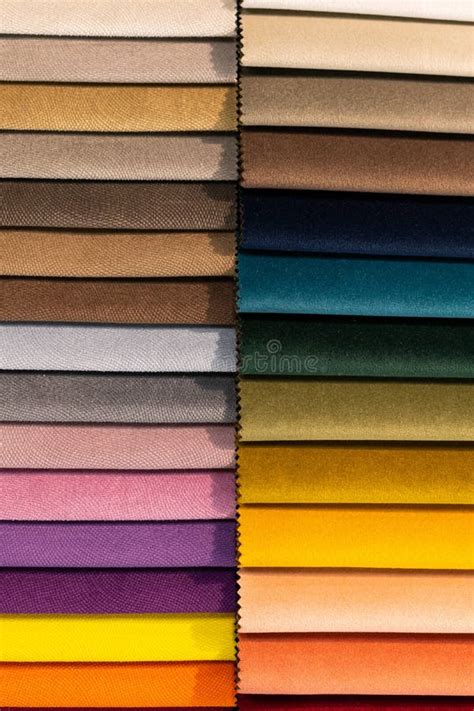 Catalog Of Multi Colored Fabric Samples Textile Industry Background