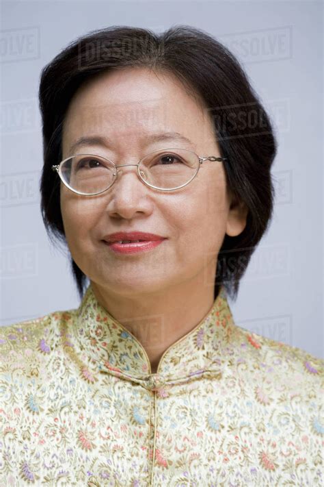 Close Up Of Asian Woman In Eyeglasses Stock Photo Dissolve