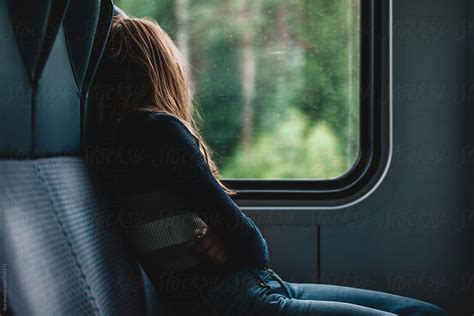 Sad Woman Travel By Train By Ilya Sad Woman Stocksy United