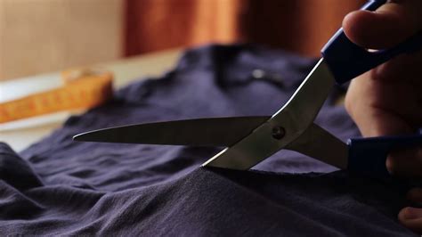 Tailor. Man Hands notch tailor tailor's scissors cloth. Close Up Stock Video Footage - Storyblocks