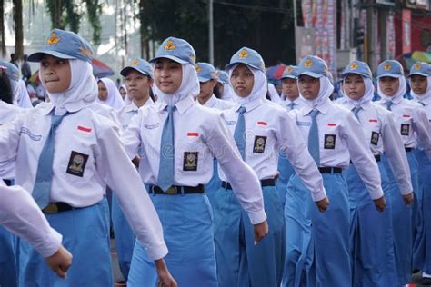 Indonesian Senior High School Students With Uniforms Marching To