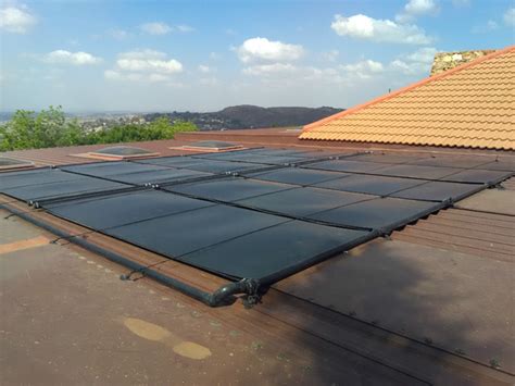Homemade pool solar rings/ squares for reducing water evaporation. Swimming Pool Solar Heating | Sun Command Solar Panels » Lex Pools