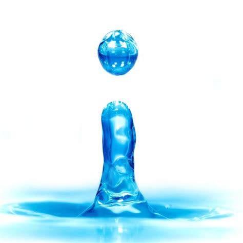 Premium Photo Falling Drop Of Blue Water