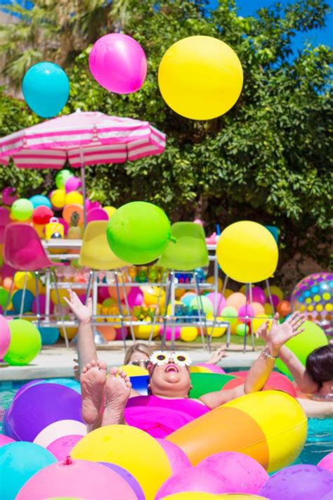 An Epic Rainbow Balloon Pool Party Pool Party Decorations Pool Birthday Party Rainbow Balloons