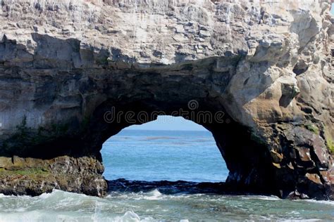 Bridge Formation At Natural Bridges Beach California Stock Image