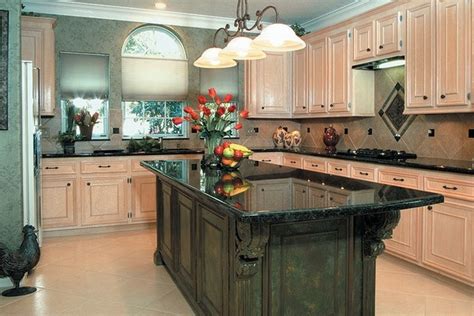 Black granite can feel warm and inviting as well as cool and contemporary, depending on the other colors (walls, floors) of the kitchen. Uba tuba granite countertops - a unique example of ...