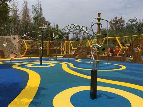 Miroad Rubber Epdm Wetpour In A Vibrant Playground Design Playground Design Rubber Tiles