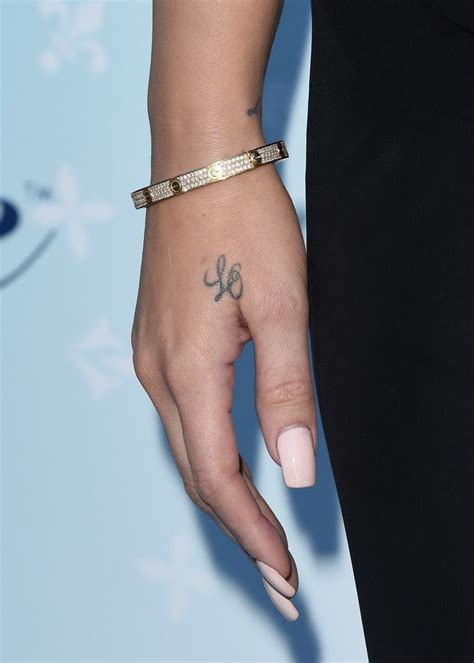 Update More Than 73 Khloe Kardashian Hand Tattoo Vn