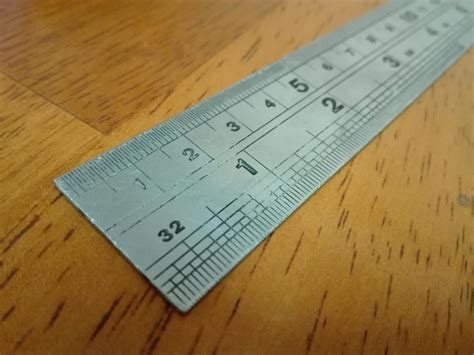 Premium Photo Close Up Of Ruler On Wooden Table