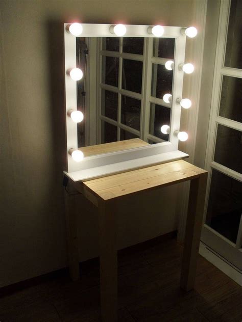 Discarding the transparent, card sheet, and backing layers of the a couple of staples into the wooden frame are more than enough to allow the wire to take the weight. 15 Ideas of Wall Mounted Lighted Makeup Mirrors
