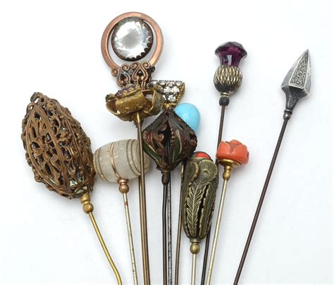 Assortment Of Victorian Hat Pins Including Sterling Silver And Carved