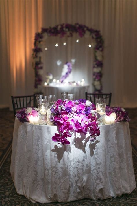 Sweetheart Table Wedding Centerpiece Purple Orchids Draping Orchids